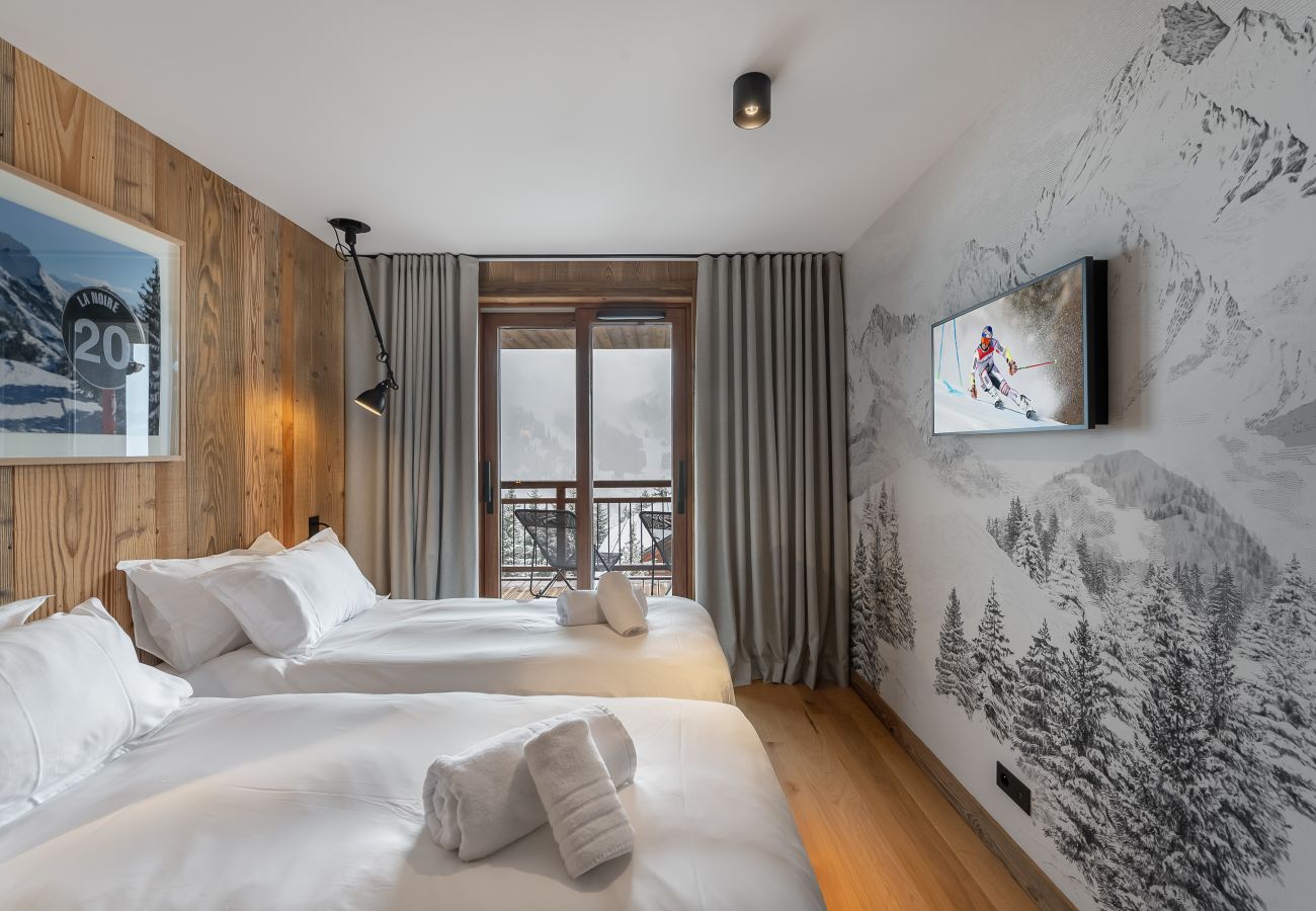 Magnificent view from our deluxe room, combining elegance and comfort, with the majestic mountains in the background