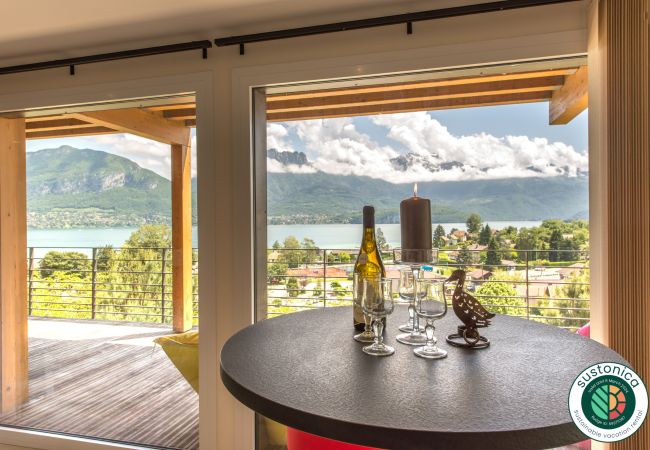 salon, maison, appartement, luxe, location saisonnière, annecy, vacances, vue lac, montagne, hôtel, jacuzzi, neige, soleil 