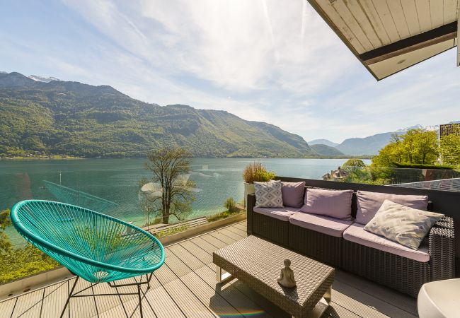 appartement de luxe, vue lac, location saisonnière, conciergerie haut de gamme, vacances, hôtel, annecy, été 