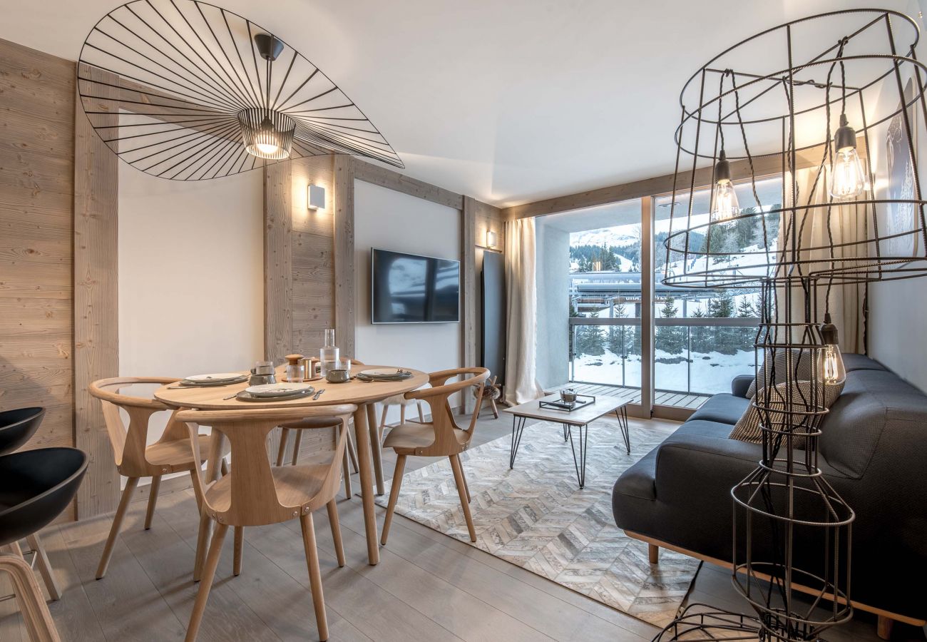 Appartement location saisonnière Courchevel proche du centre et des pistes, conciergerie haut de gamme montagne, airbnb luxe 