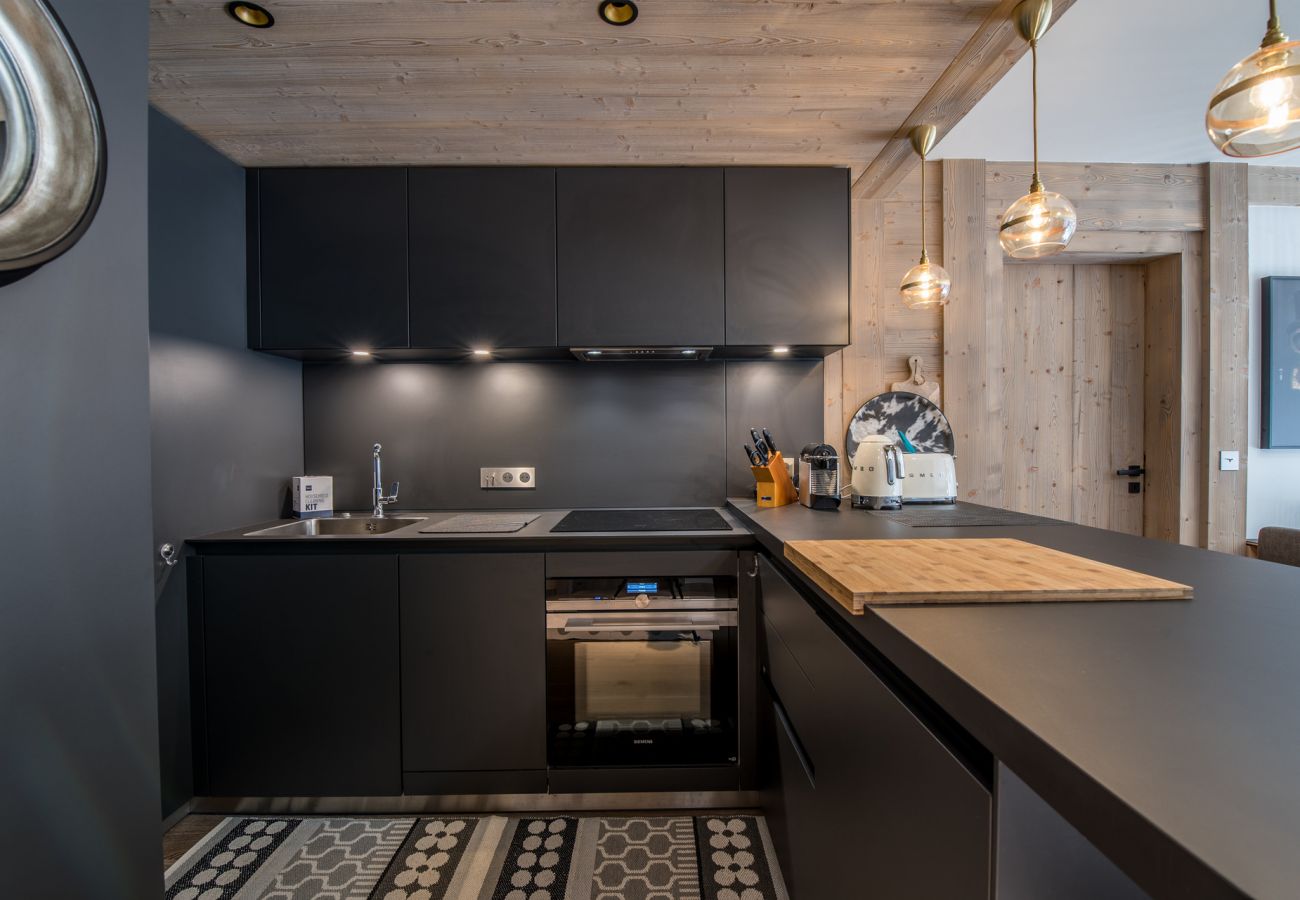 Réservez un appartement de ski à Courchevel pour des vacances d'hiver avec une cuisine entièrement équipée en SMEG 