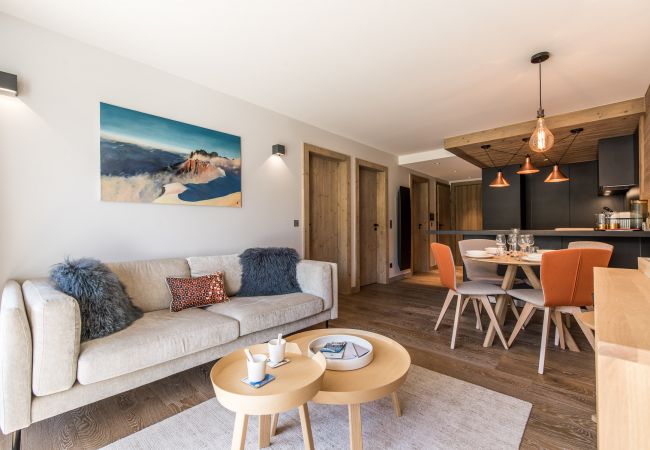 Appartement à louer Courchevel pieds des pistes avec piscine, location de luxe dans les alpes, conciergerie au centre village