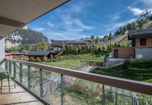 Appartement à louer Courchevel pieds des pistes avec piscine, location de luxe dans les alpes, conciergerie au centre village