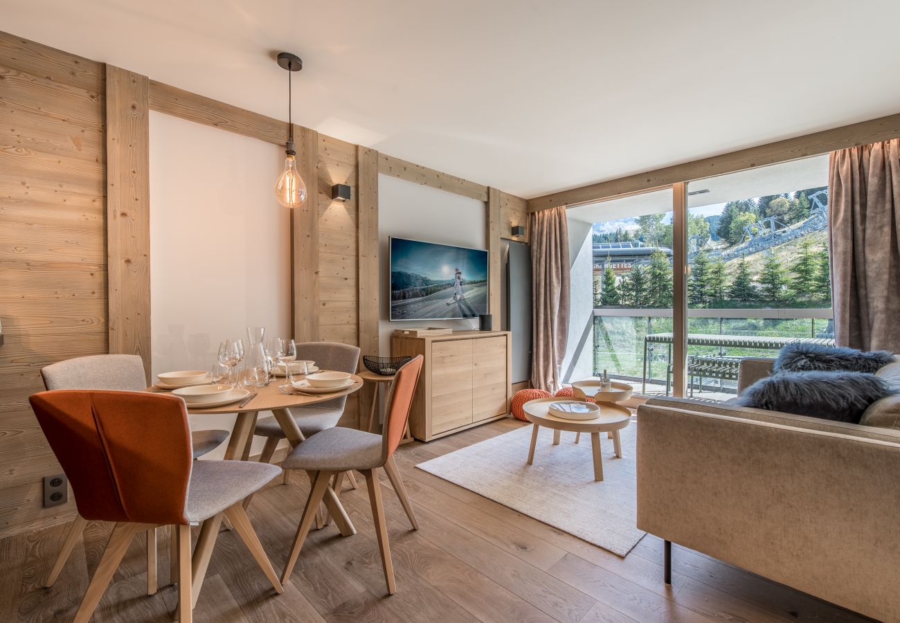 Appartement à louer Courchevel pieds des pistes avec piscine, location de luxe dans les alpes, conciergerie au centre village