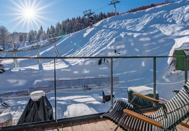 Appartement location saisonnière Courchevel pieds des pistes, airbnb luxe dans les alpes, ski in out proche du centre 