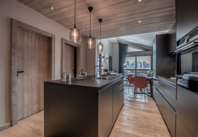 Appartement location saisonnière Courchevel pieds des pistes, airbnb luxe dans les alpes, ski in out proche du centre  