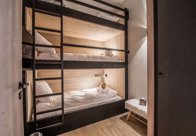 Appartement location saisonnière Courchevel pieds des pistes, airbnb luxe dans les alpes, ski in out proche du centre 