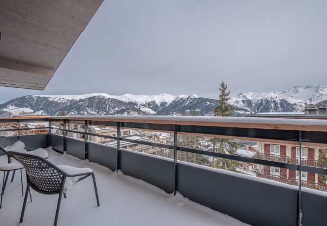 Appartement location saisonnière Courchevel pieds des pistes, airbnb luxe dans les alpes, ski in out proche du centre 