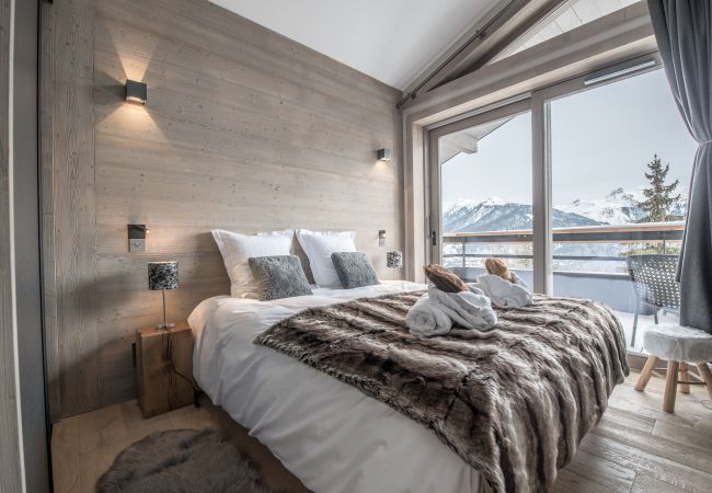 Appartement location saisonnière Courchevel pieds des pistes, airbnb luxe dans les alpes, ski in out proche du centre 