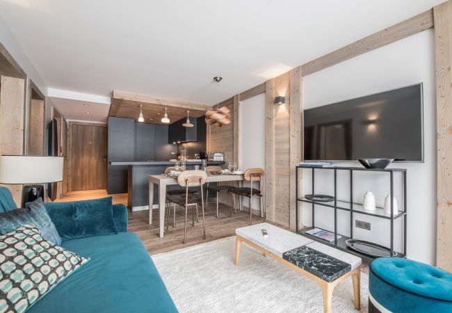 Appartement à louer Courchevel pieds des pistes avec piscine, location de luxe dans les alpes, conciergerie au centre village