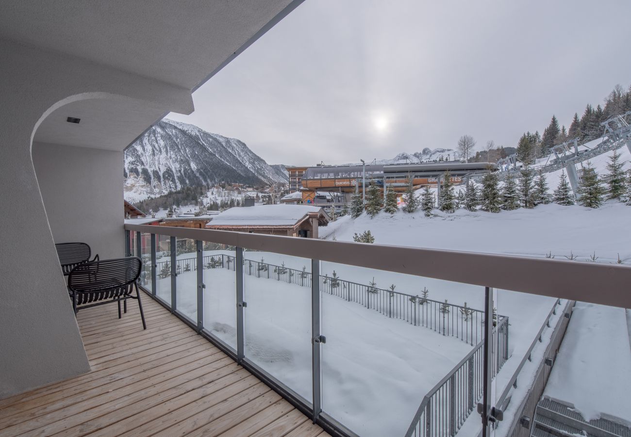 Appartement à louer Courchevel pieds des pistes avec piscine, location de luxe dans les alpes, conciergerie au centre village