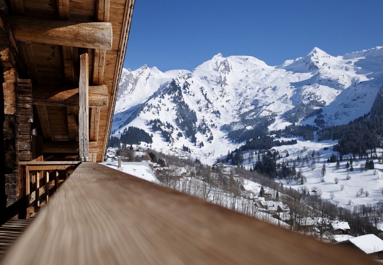balcon, vue montagnes, la Balme, neige, soleil, cosy, moment en famille, partage, location de luxe, à louer en hiver