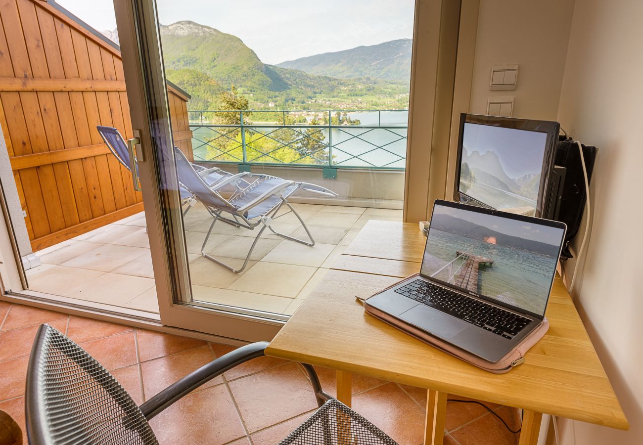 appartement de standing, vue lac, location saisonnière Premium, annecy, conciergerie haut de gamme, vacances, airbnb luxe