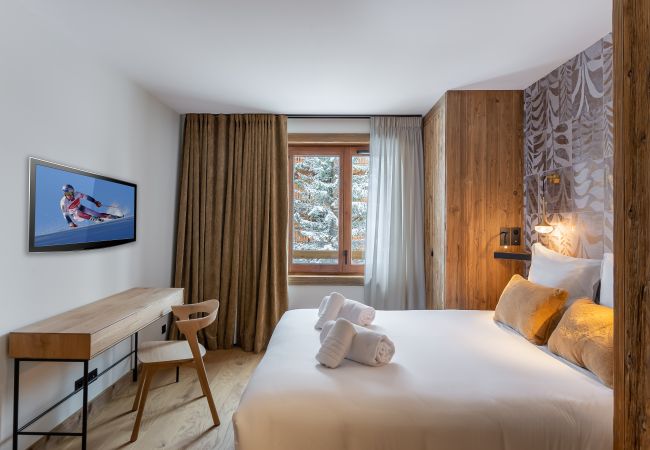 Appartement location saisonnière Méribel proche du centre et des pistes, conciergerie haut de gamme montagne, airbnb luxe 