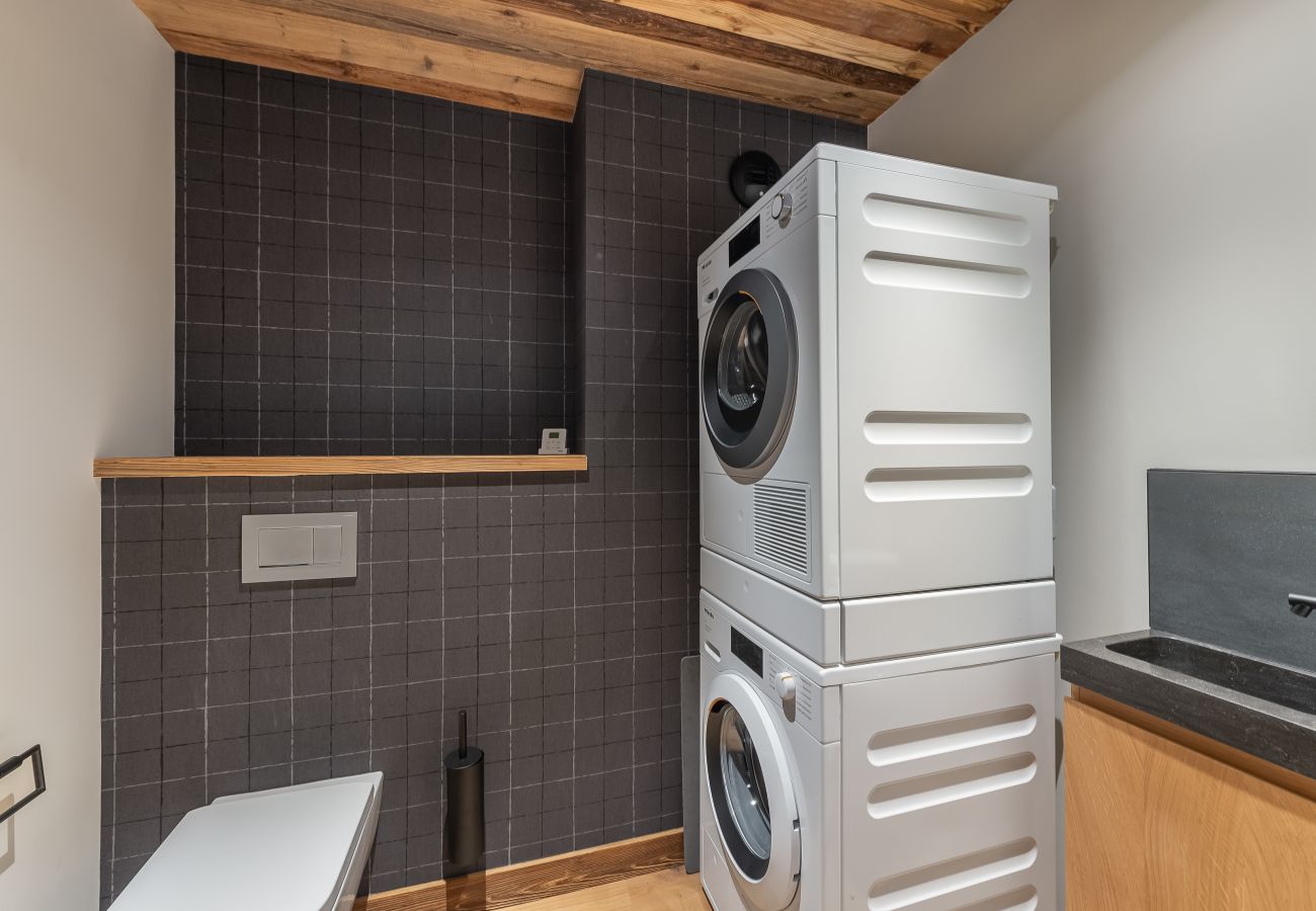 Appartement location saisonnière Méribel proche du centre et des pistes, conciergerie haut de gamme montagne, airbnb luxe 