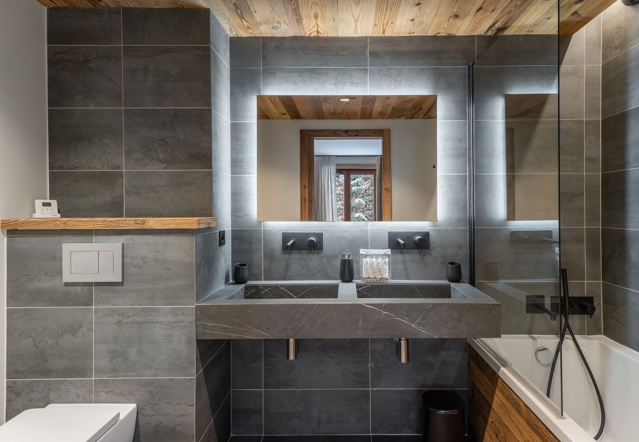 Appartement location saisonnière Méribel proche du centre et des pistes, conciergerie haut de gamme montagne, airbnb luxe 