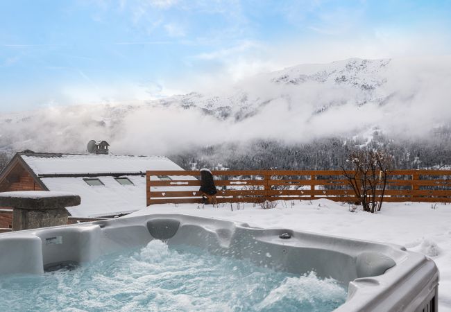 Chalet Méribelle, location en montagne, vacances au ski avec jacuzzi et vue panoramique, chalet de luxe, équipements modernes