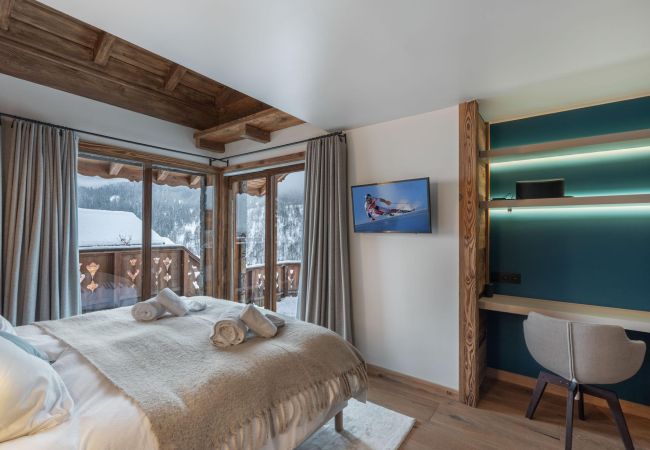 Grand chalet en location Méribel, airbnb montagne 15 personnes, vacances au ski proche des pistes, luxe alpes françaises