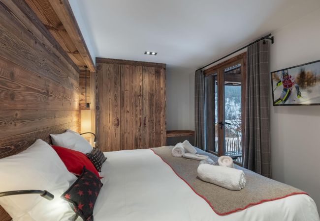 Grand chalet en location Méribel, airbnb montagne 15 personnes, vacances au ski proche des pistes, luxe alpes françaises